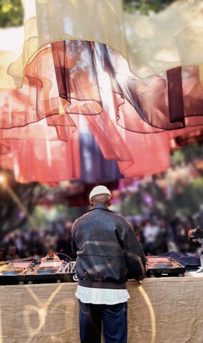 Second DJ set beneath the canopy at dusk